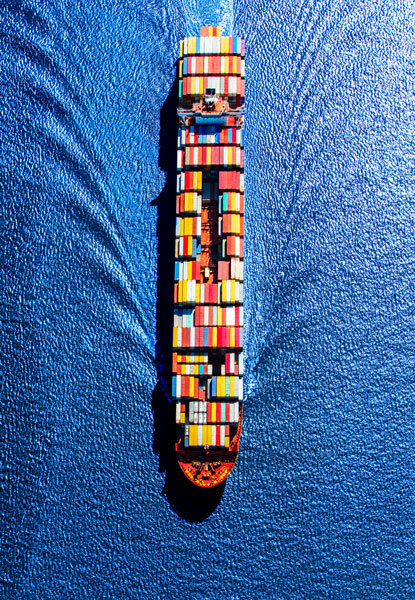 A fully loaded container ship heads toward the Port of Houston from the Gulf of Mexico.