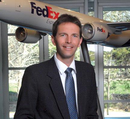 Tom Schmitt, president and CEO of FedEx Global Supply Chain Services, brings his action-oriented leadership style to his role as chairman of the board of the Memphis Regional Chamber.<br />Photos courtesy of FedEx and Memphis Regional Chamber