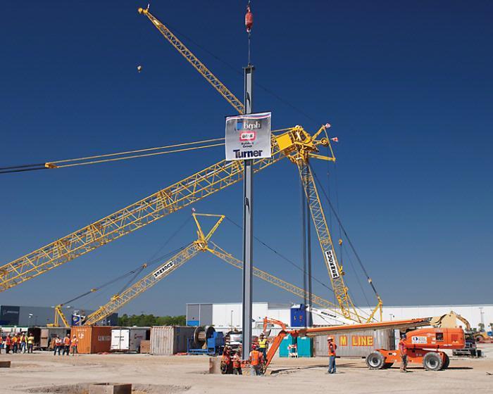 On April 5, 2010, the first steel column was placed (left) for Boeing’s 1.2-million-sq.-ft. (92,903-sq.-m.) Charleston 787 Final Assembly and Delivery facility. 