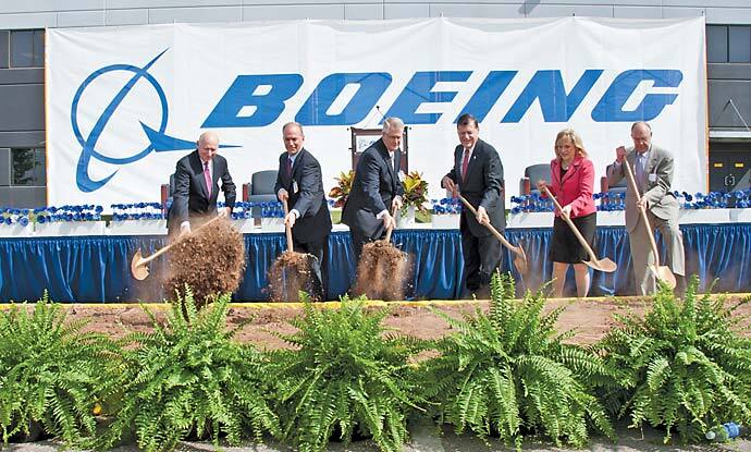 Boeing and Oklahoma officials, including Gov. Mary Fallin, second from right, broke ground April 26th on a new facility the aerospace giant will lease in Oklahoma City. The six-story, 320,000-sq.-ft. (29,700-sq.-m.) building will be home to the Boeing B-1 bomber program and C-130 Avionics Modernization Program, which are transitioning to Oklahoma.