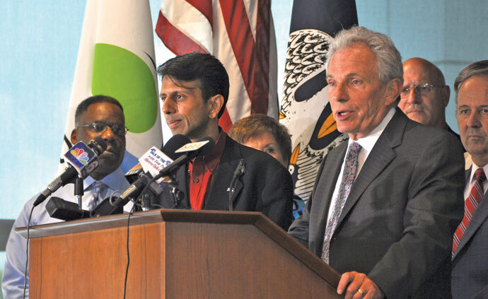 Ronpak founder Ron Sedley (right) is joined by Louisiana Gov. Bobby Jindal to announce the company’s headquarters relocation to Shreveport-Bossier after setting up manufacturing there just last year.
