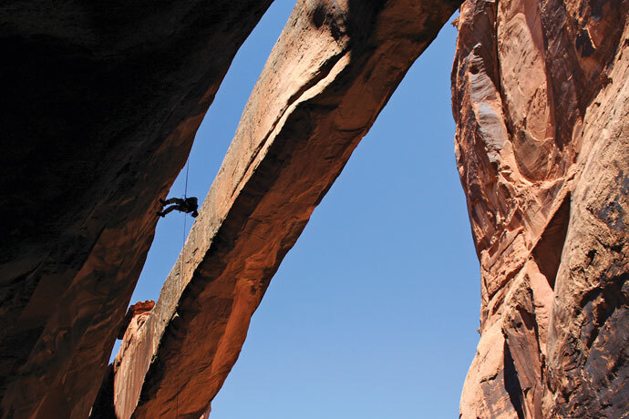 Climbing Morning Glory Arch, Moab, Utah.