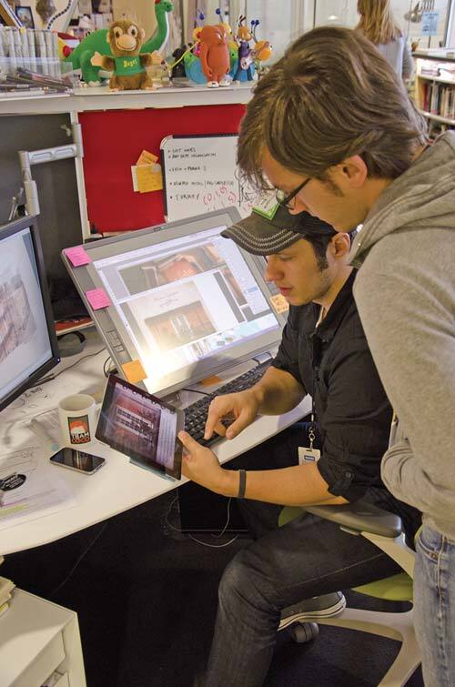 Moonbot Studios illustrator Joe Bluhm, right, and technical director Bohdon Sayre work on a project.