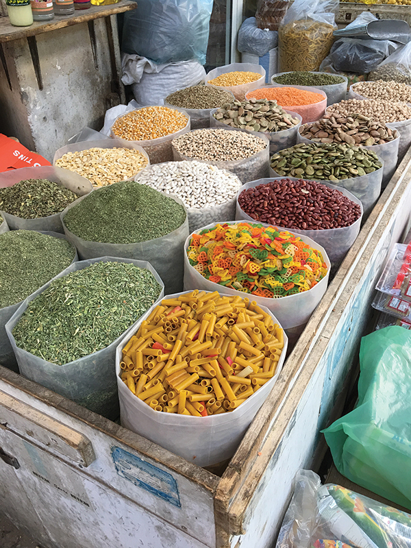 Exotic spices, candies and pastas outside a shop in the Manama souk.