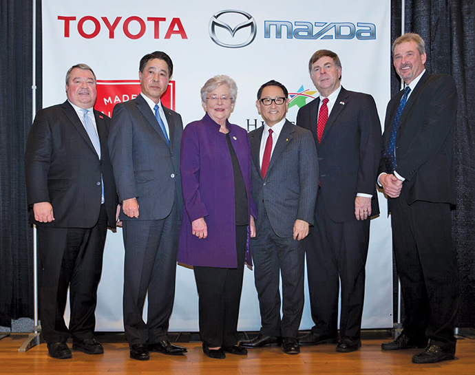 Pictured (l. to r.) at the announcement of Huntsville’s $1.6-billion vehicle production plant are Alabama Commerce Secretary Greg Canfield, Mazda CEO Masamichi Kogai, Alabama Governor Kay Ivey, Toyota President Akio Toyoda, Huntsville Mayor Tommy Battle, and Limestone County Commission Chairman Mark Yarbrough.