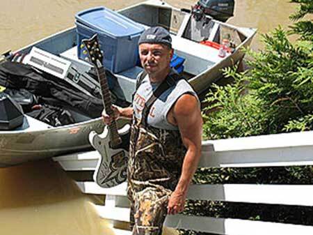 Nashville Area Chamber President and CEO Ralph Schulz credits Mayor Karl Dean with the decision to allow residents to use their own boats in rescue and recovery efforts. Here, country musician Kenny Chesney was able to put his boat to use in rescuing important equipment.