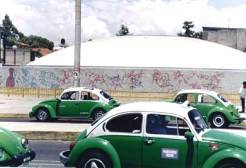 Lovebug taxis troll the Mexican capital's streets.