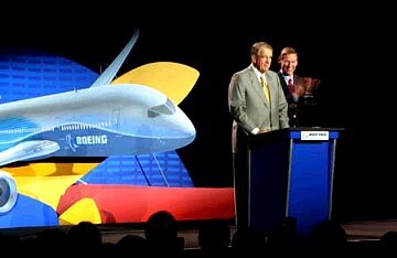 Harry Stonecipher (left), president and chief executive officer of The Boeing Company
