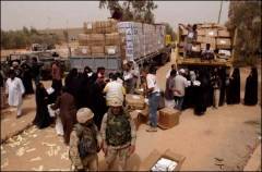 Water being unloaded by U.S. troops and volunteers.