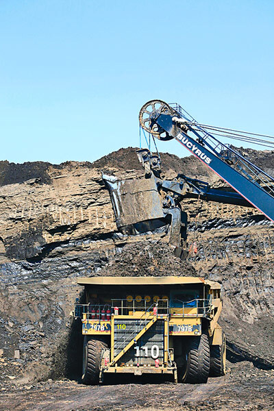 The 797B Caterpillar mining trucks used for the Athabasca oil sands project at