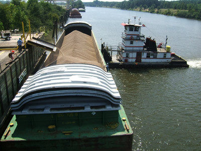 Enviva loads pellets onto a barge on the Tenn-Tom Waterway from its facility in Amory, Miss.