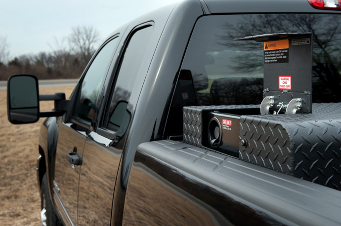 The 2013 bi-fuel Chevrolet Silverado HD includes a compressed natural gas (CNG) capable engine that GM says seamlessly transitions between CNG and gas fuel systems. The CNG and gasoline tanks have a combined range of 650 miles.